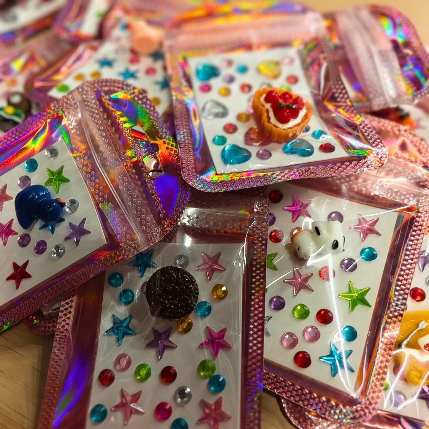 12x Mini Party Favors | Holographic Pink Bag with Mystery Resin Mini & Craft Stickers